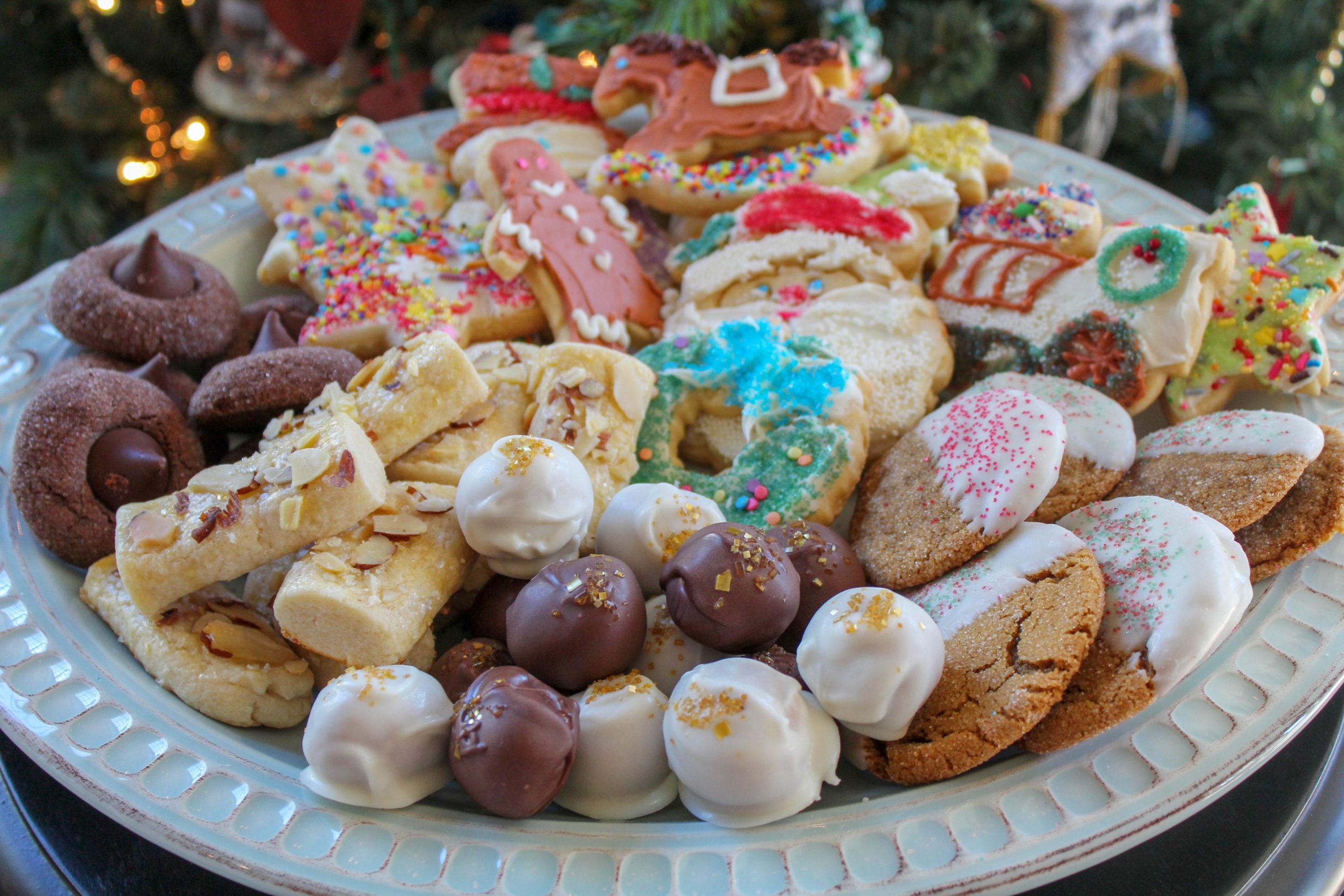 assorted decorated sugar cookies on a festive platter