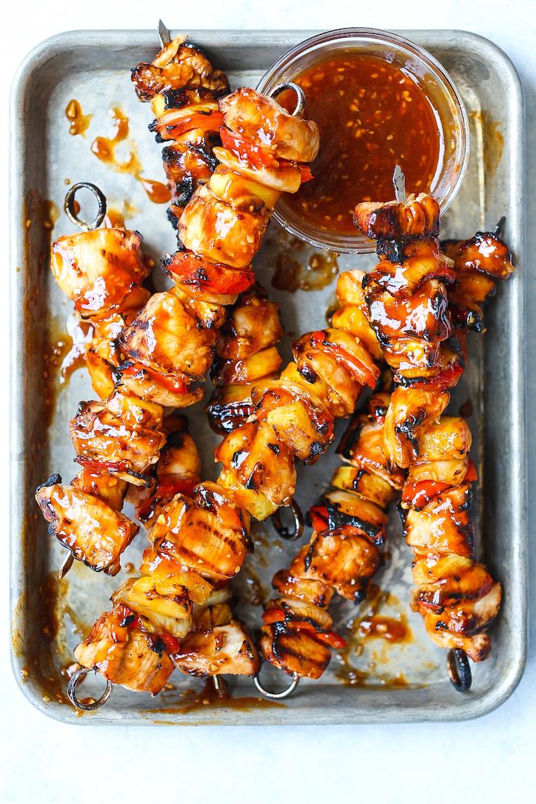 grilled pineapple chicken skewers on a grill