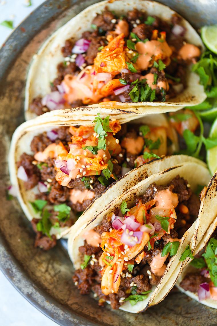 Sriracha Lime Ground Beef Tacos with fresh toppings