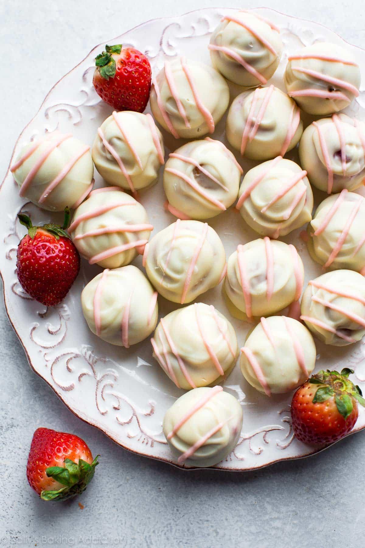 Strawberry cheesecake bar truffles on a serving platter