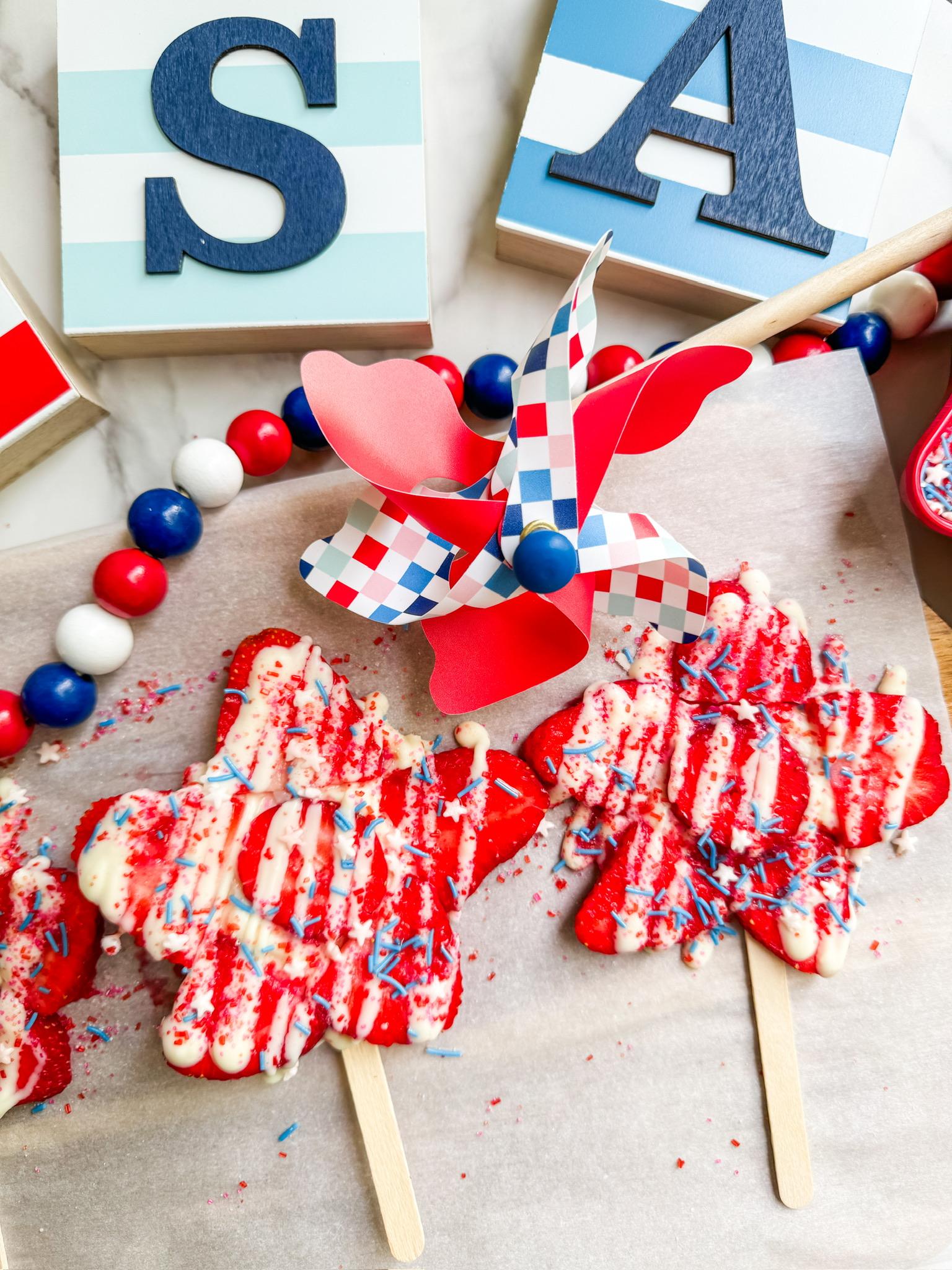 hands preparing patriotic pinwheels in a kitchen