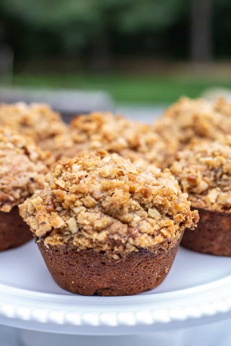 close up of banana nut muffins on a plate