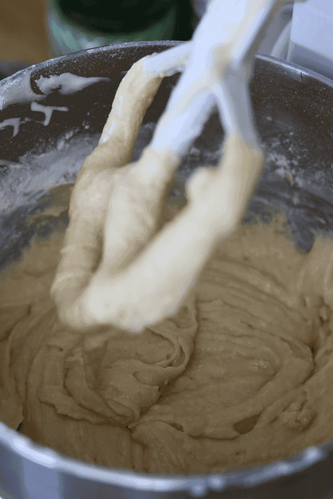 hands kneading rhubarb sourdough dough