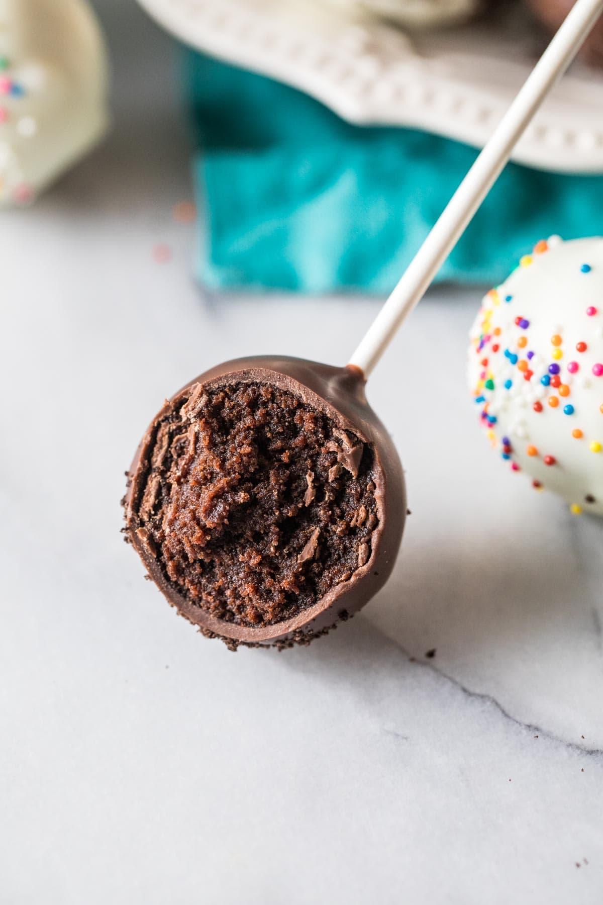 Close-up of a perfectly dipped and decorated Mexican chocolate cake pop