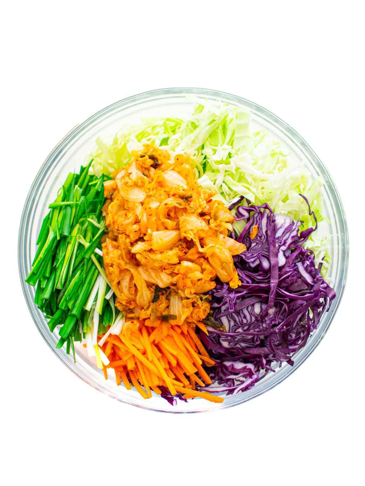 overhead shot of kimchi slaw being prepared