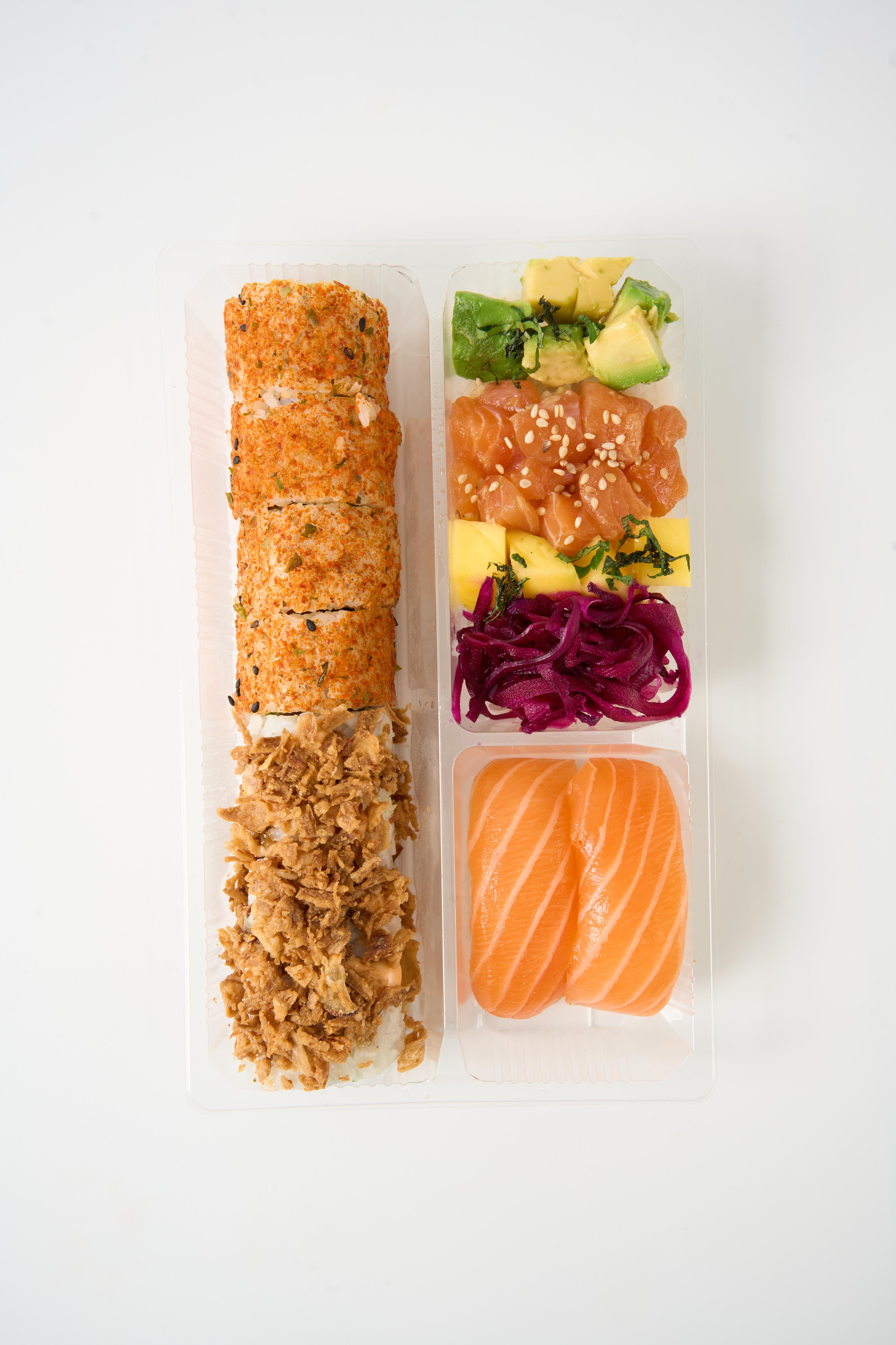 Overhead shot of a beautifully arranged Spicy Salmon Avocado Bento Box