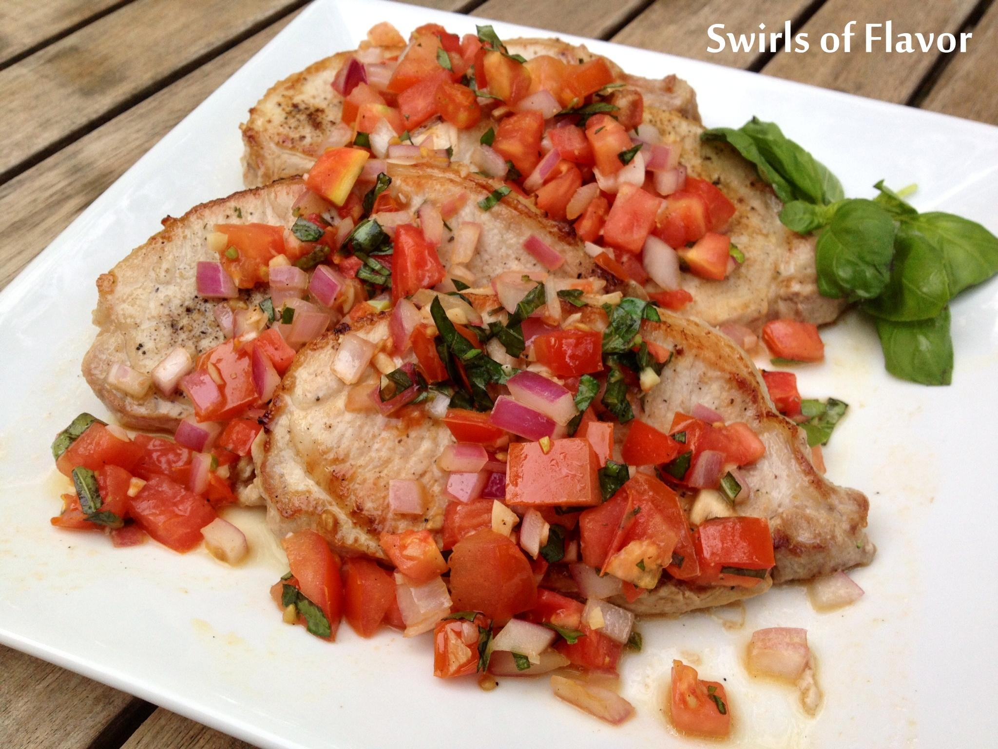 pork chops topped with fresh tomato-basil relish