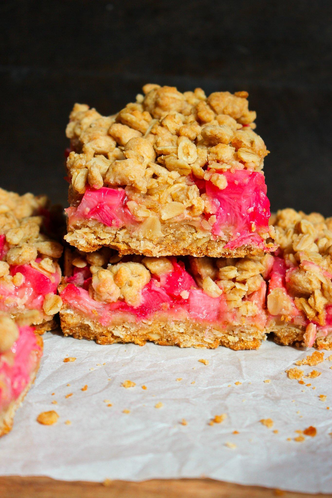 Rhubarb Oat Slice with Maple Syrup on a wooden cutting board
