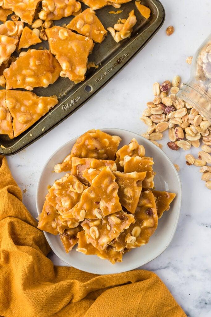 finished peanut brittle on a plate, ready to serve