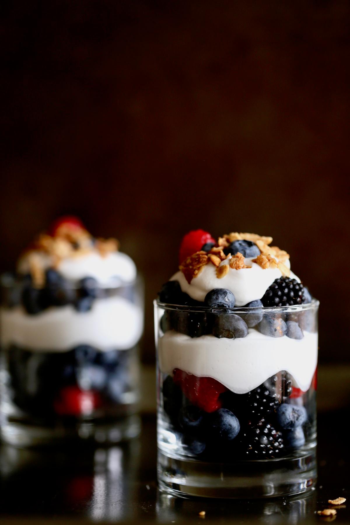 Berry waffles parfait with whipped cream and fresh berries
