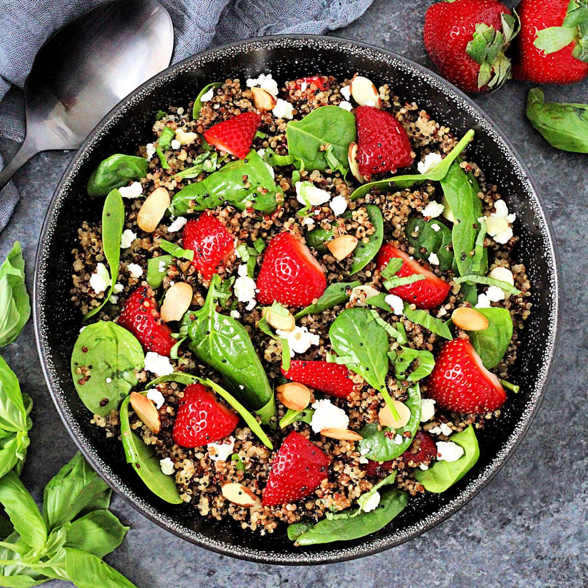 Close-up shot of the Strawberry Spinach & Quinoa Power Salad showing the different textures and ingredients