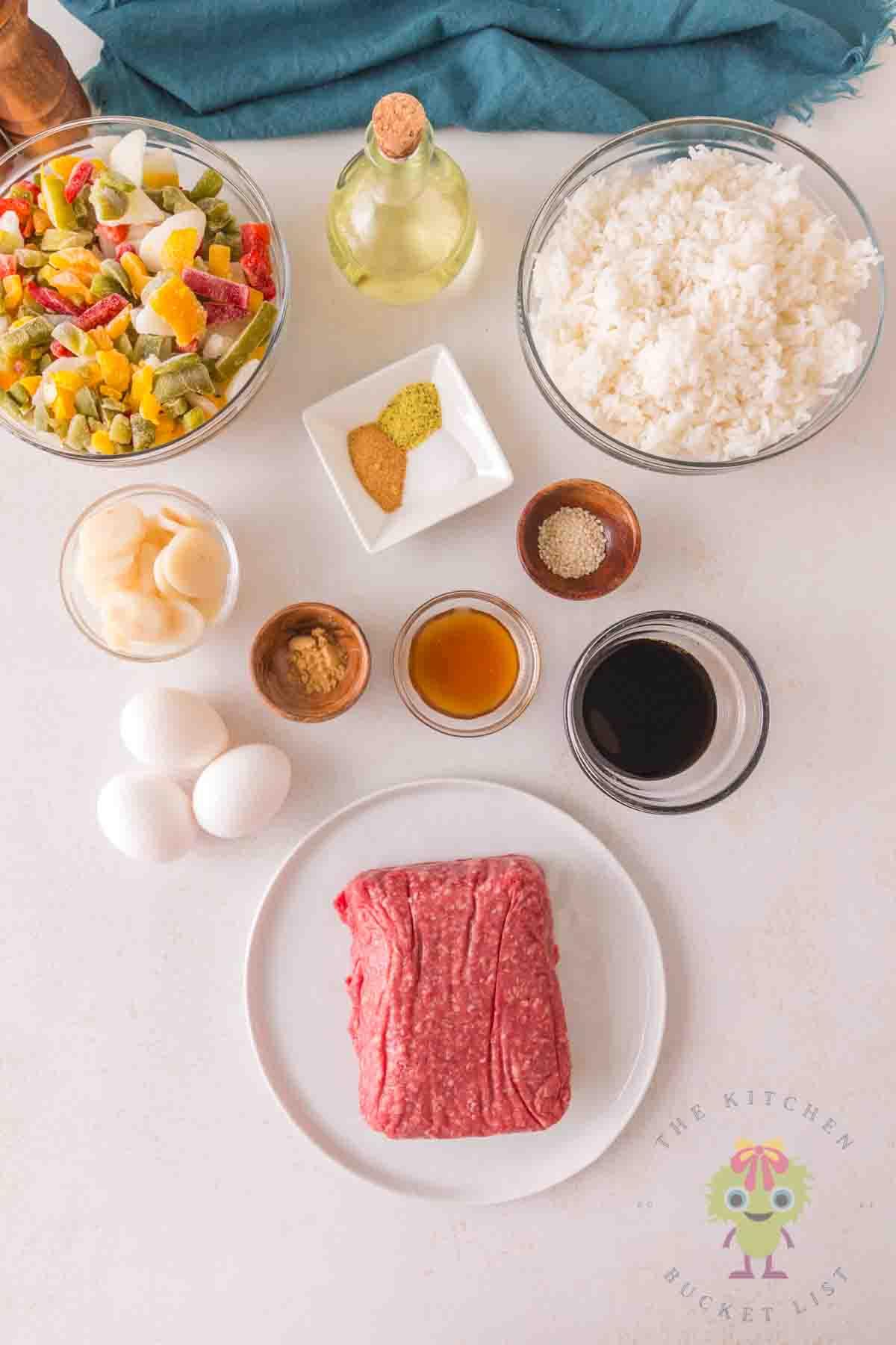 overhead shot of prepared ingredients for beef fried rice