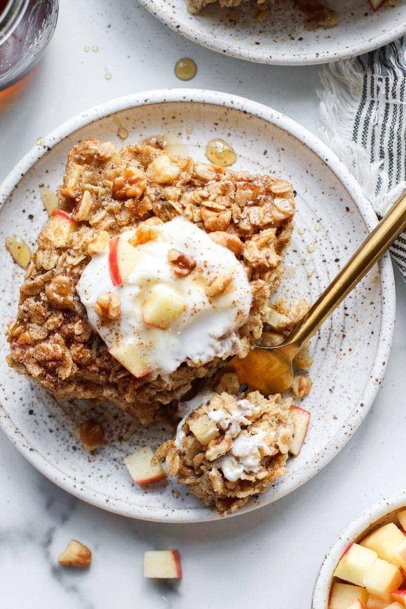 overhead shot of apple cinnamon oatmeal baked apples in baking dish