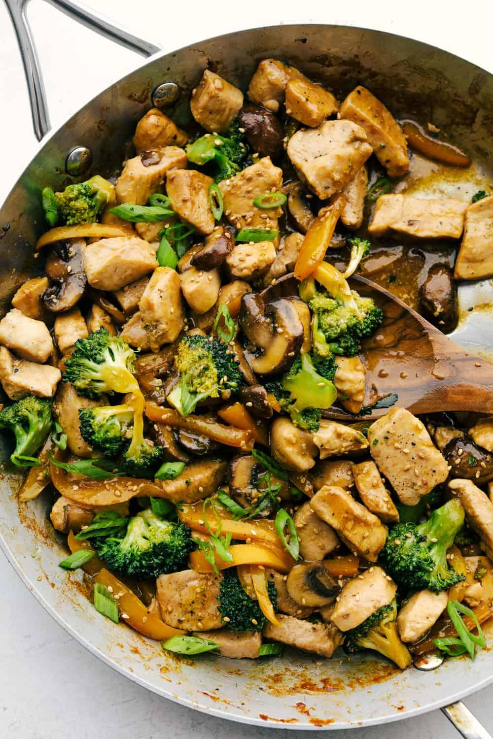 Garlic Butter Chicken Stir-Fry in wok, vibrant vegetables