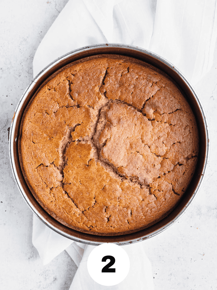 overhead shot of the spice cake batter being poured into a baking pan
