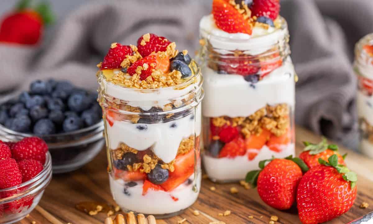 close up shot of Paella Rice Yogurt Parfait beautifully plated with fresh berries