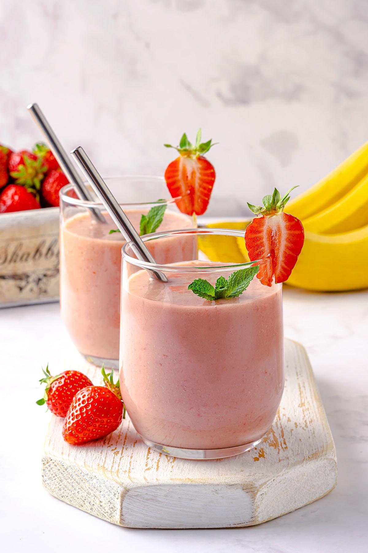 avocado cream strawberry banana smoothie in glass