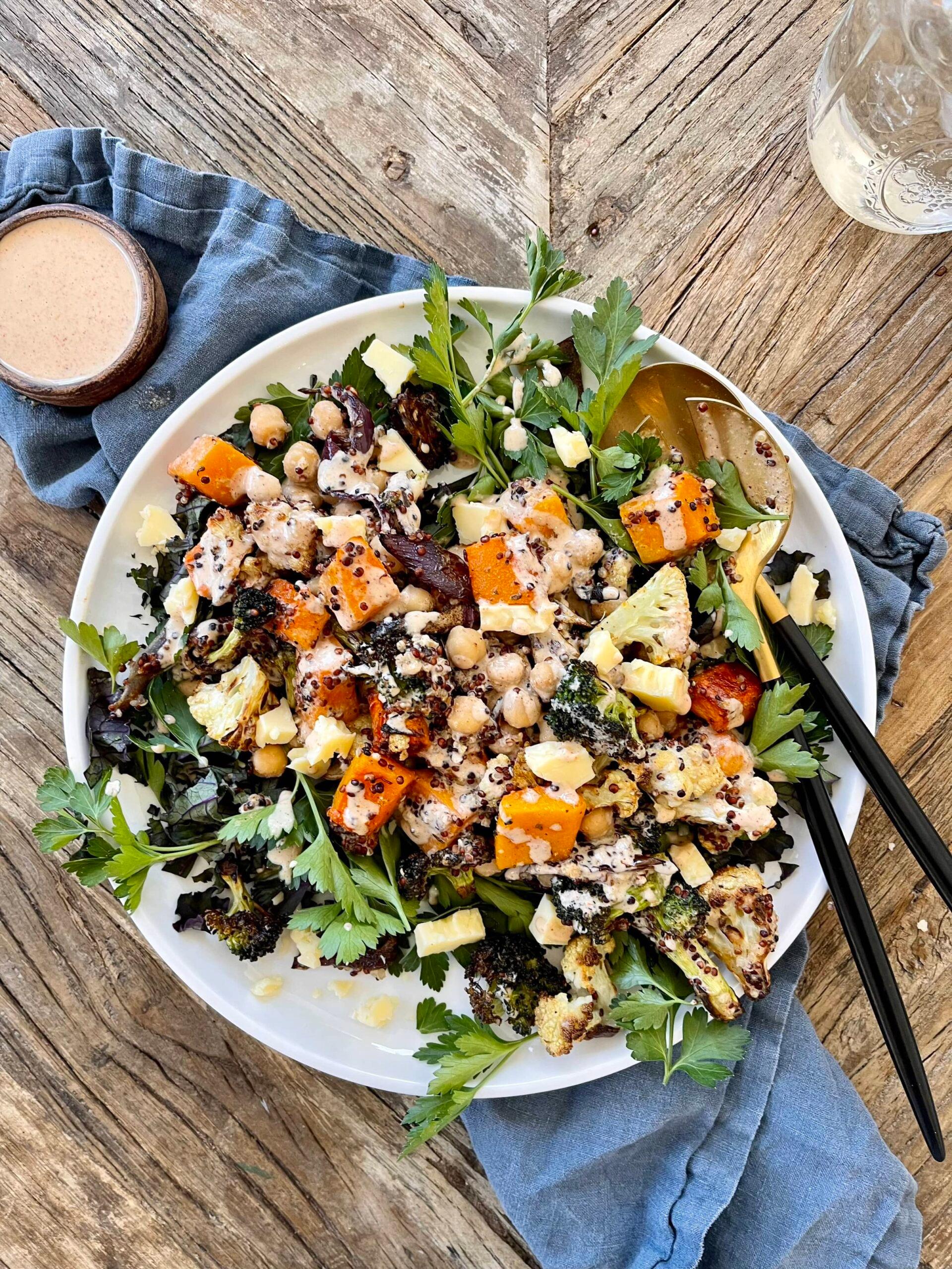 vibrant quinoa salad with roasted vegetables and lemon vinaigrette drizzled on top
