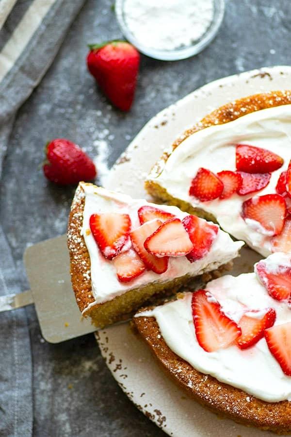 slice of strawberry cornmeal cake showing the texture