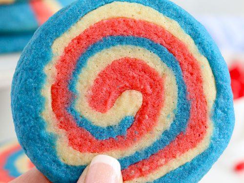 close-up of sliced patriotic pinwheel cookies ready to bake