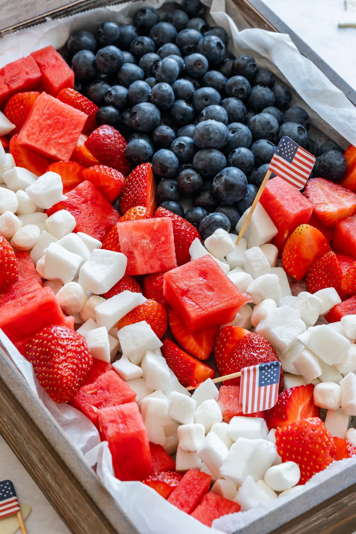 Close-up shot of American Flag Fruit Dip being served with fresh fruit