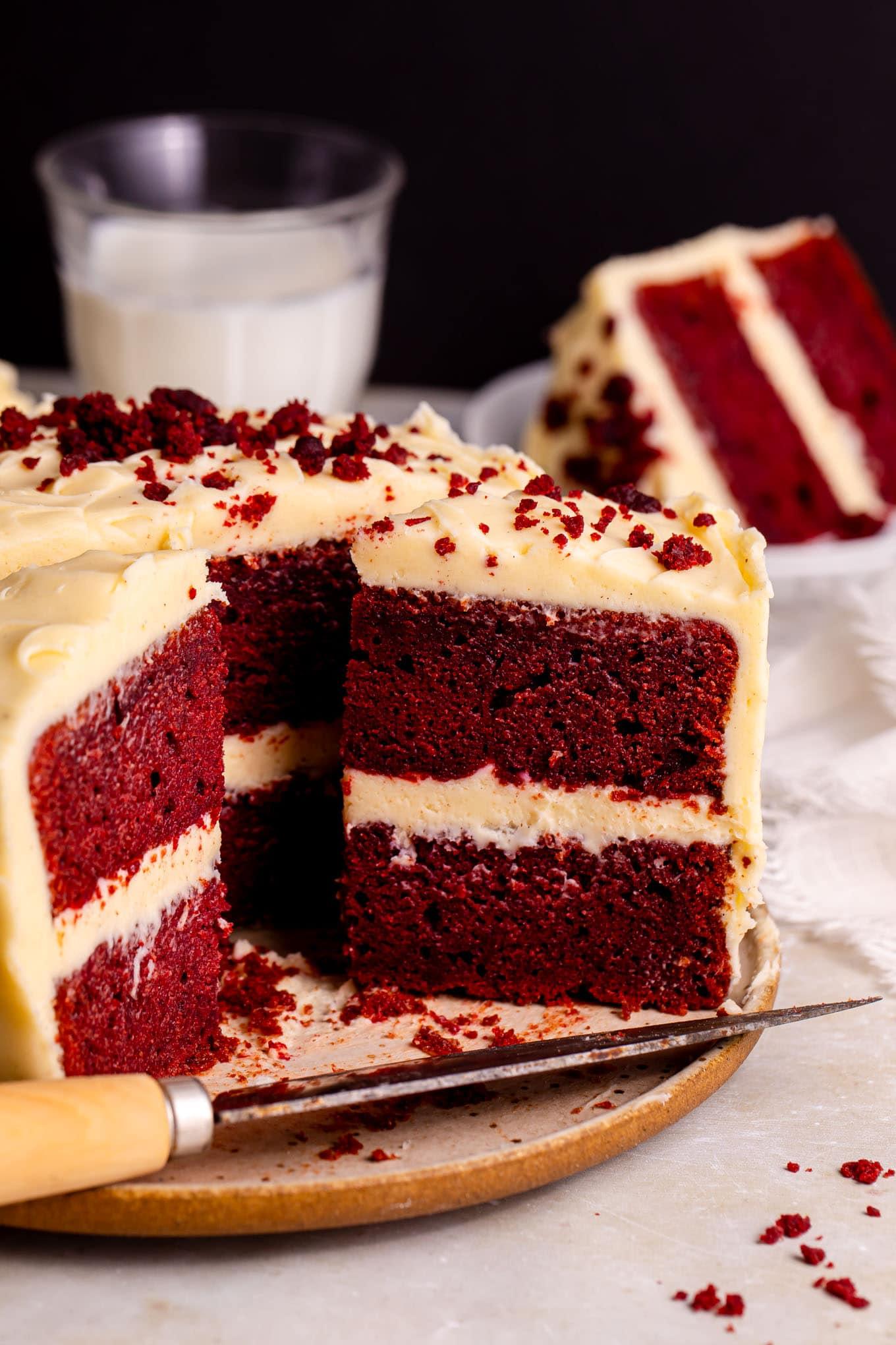 ruby red velvet cake with cream cheese frosting and beetroot garnish