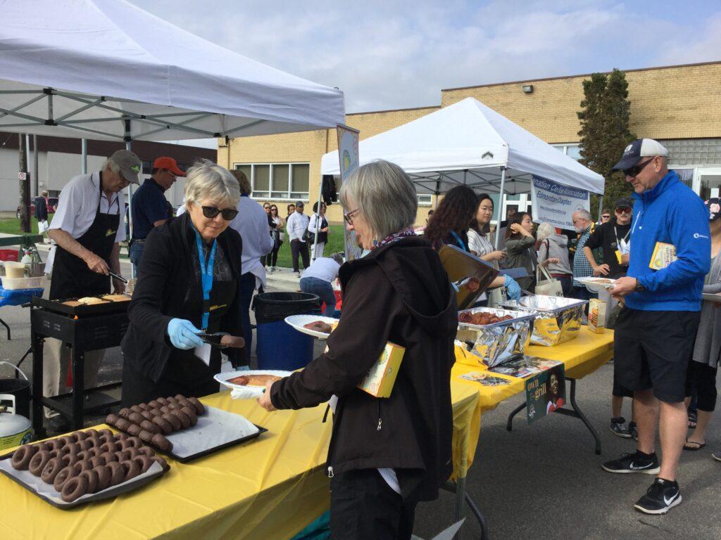 a family gathered around a table, enjoying a breakfast of Canadian gluten-free pancakes