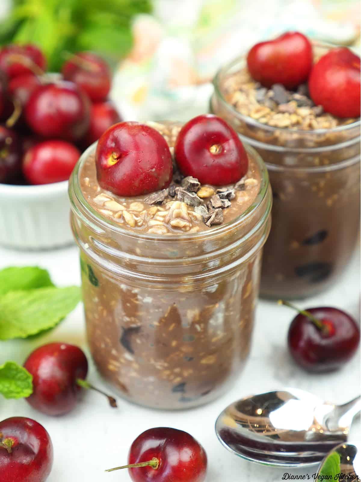 cherry chocolate overnight oats in mason jars