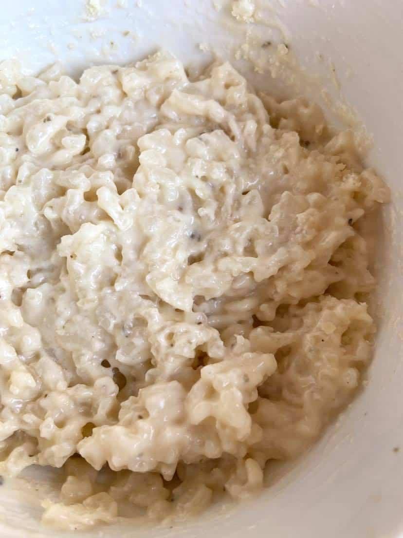 creamy rosemary and garlic risotto being served