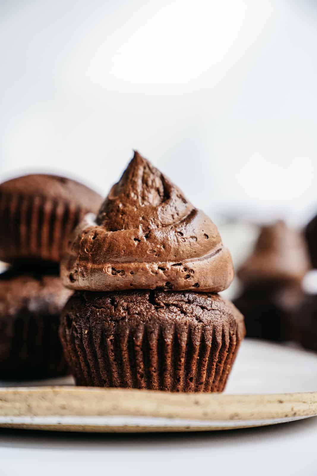 vegan brownie muffins on a rustic wooden table