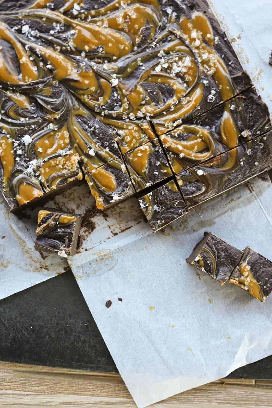 Salted caramel swirl fudge being swirled in a pan