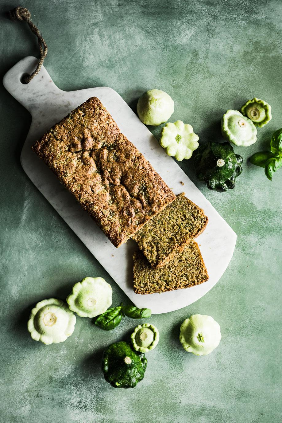 a slice of lemon basil zucchini bake being served