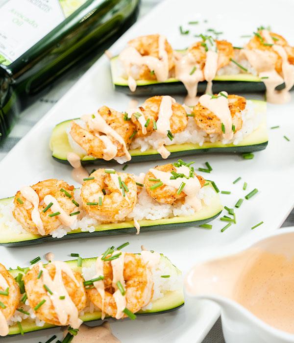 close-up shot of stuffed zucchini boats with shrimp and zucchini noodles