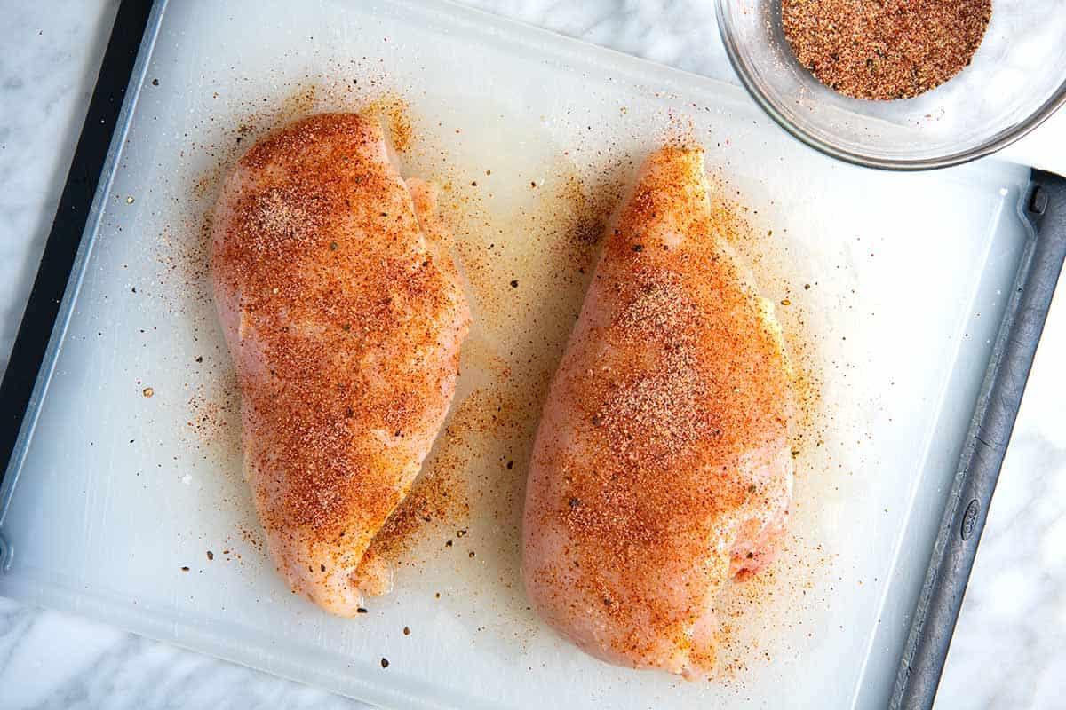 raw chicken breast prep seasoned