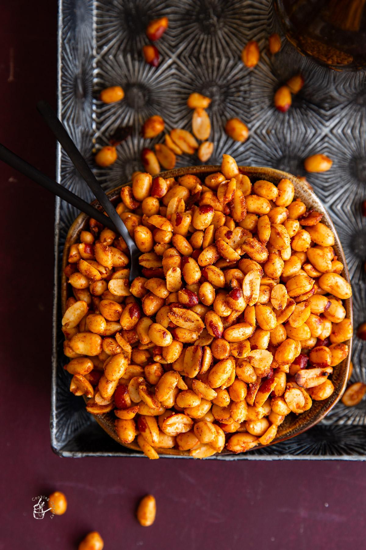 ingredients for peanut chili, arranged on a wooden table