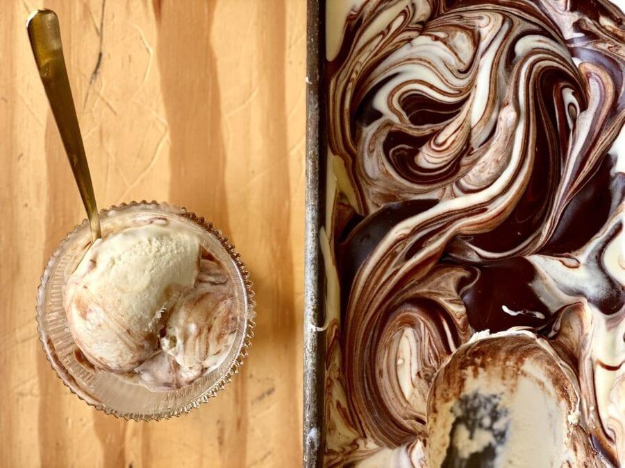 swirls of spicy chocolate ice cream being churned in an ice cream maker
