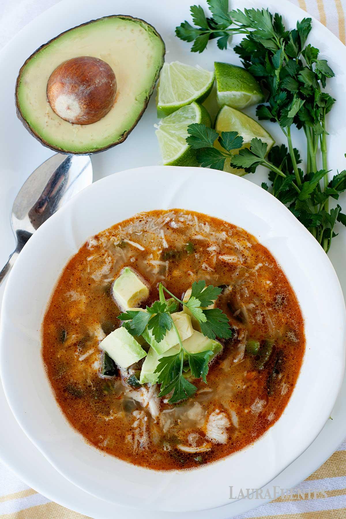 overhead shot of yuzu habanero chicken chili in a rustic bowl
