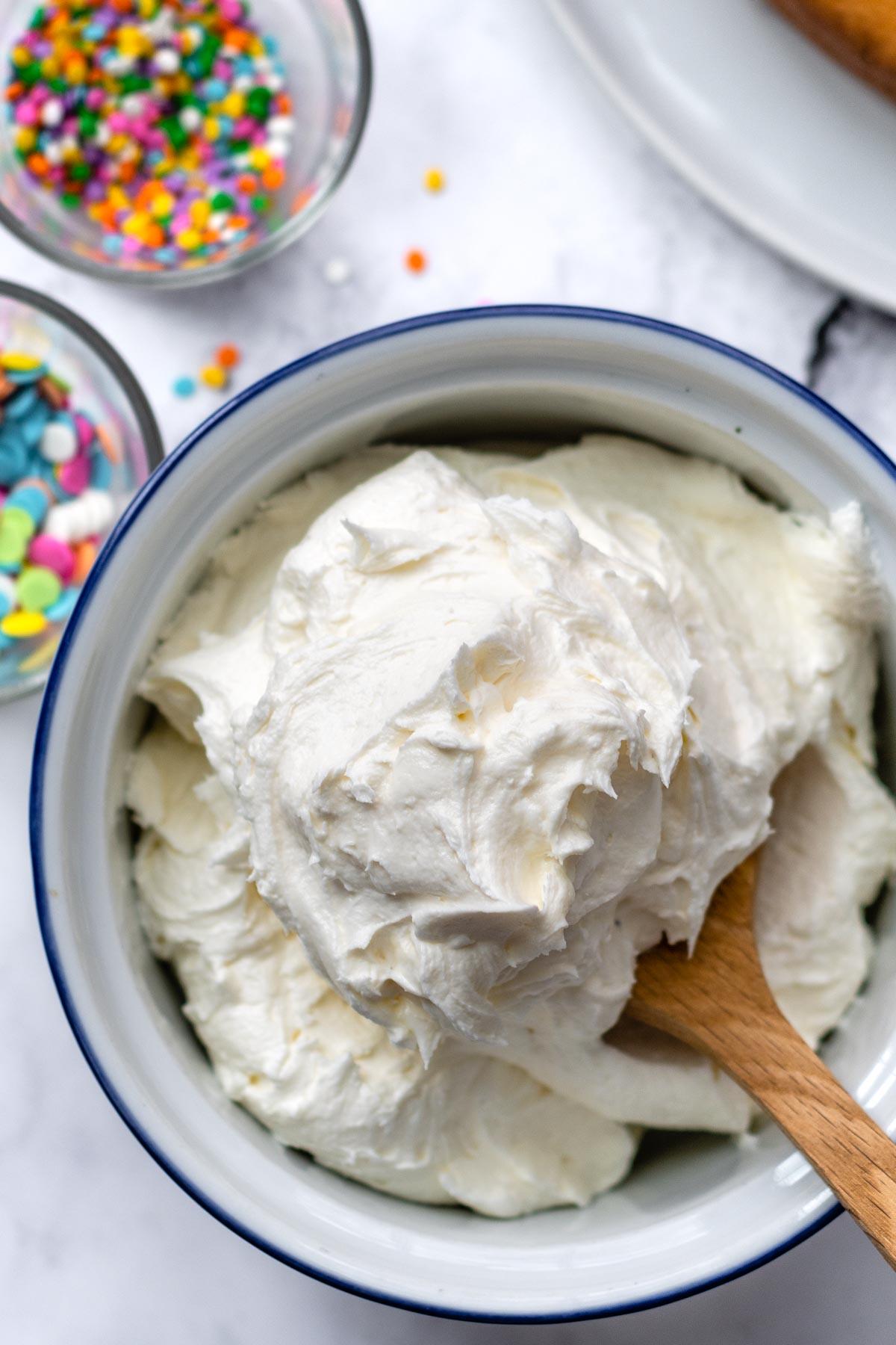 bowl of fluffy buttercream frosting