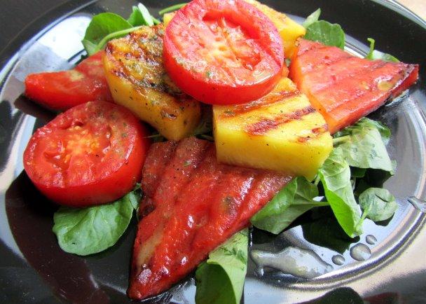 close up of watermelon and grilled pineapple salad with mint