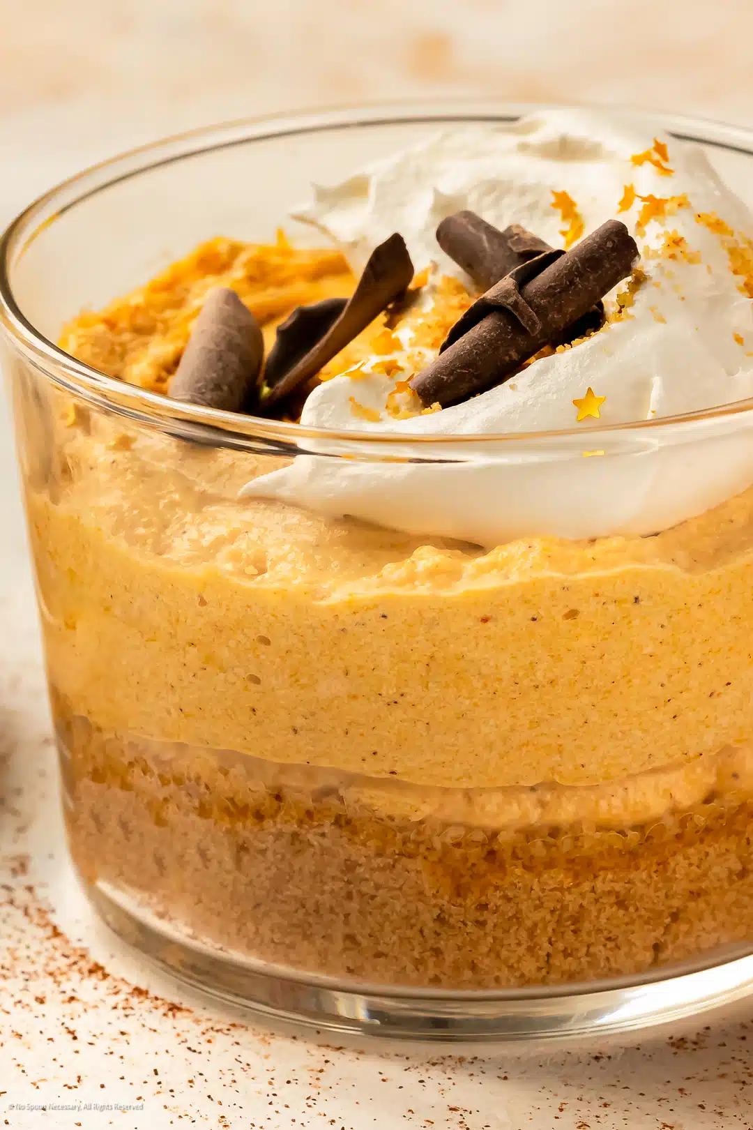 close-up of a spoon scooping into a cold brew trifle, highlighting the textures