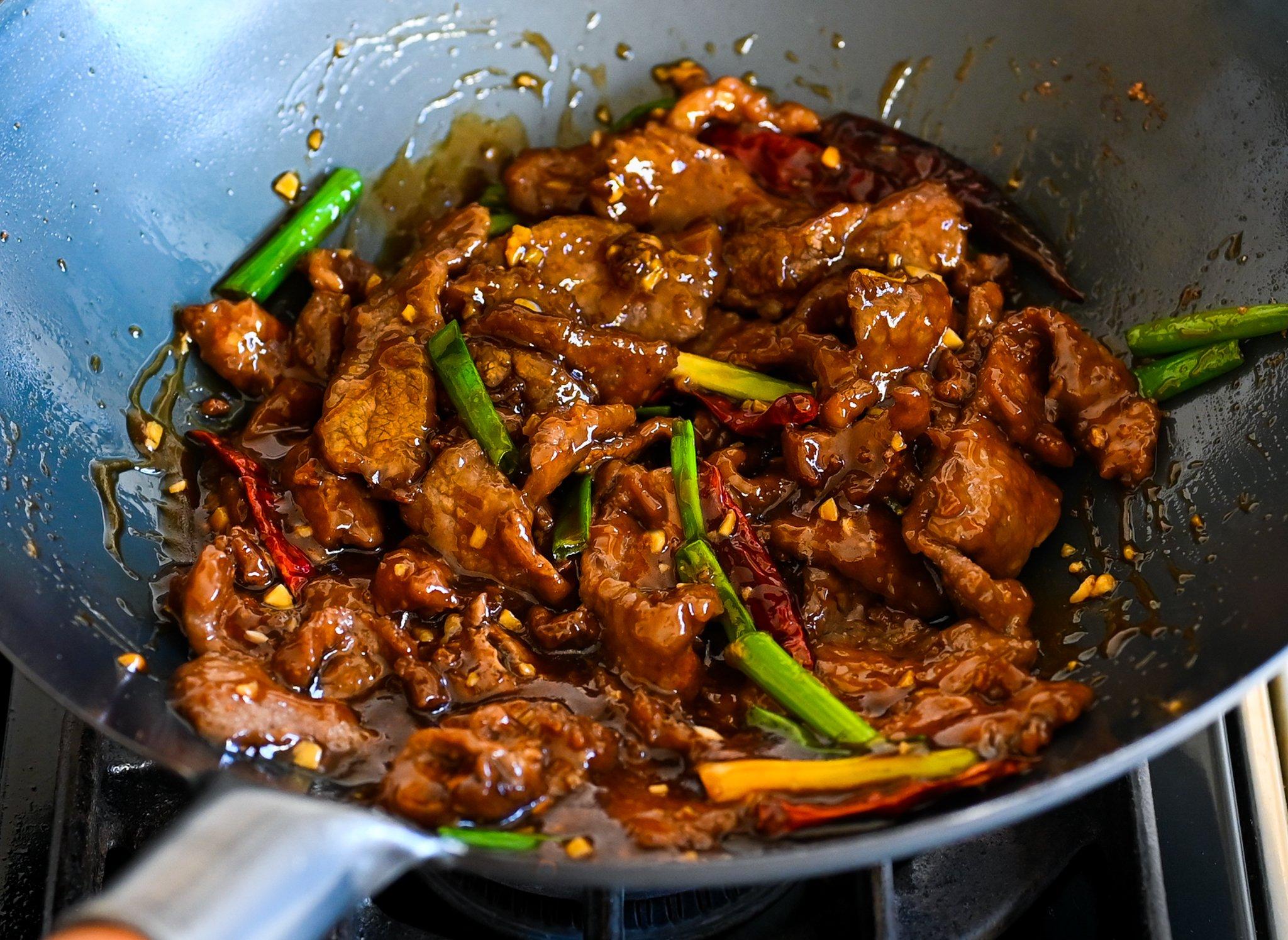 Mongolian beef stir-fry in a wok