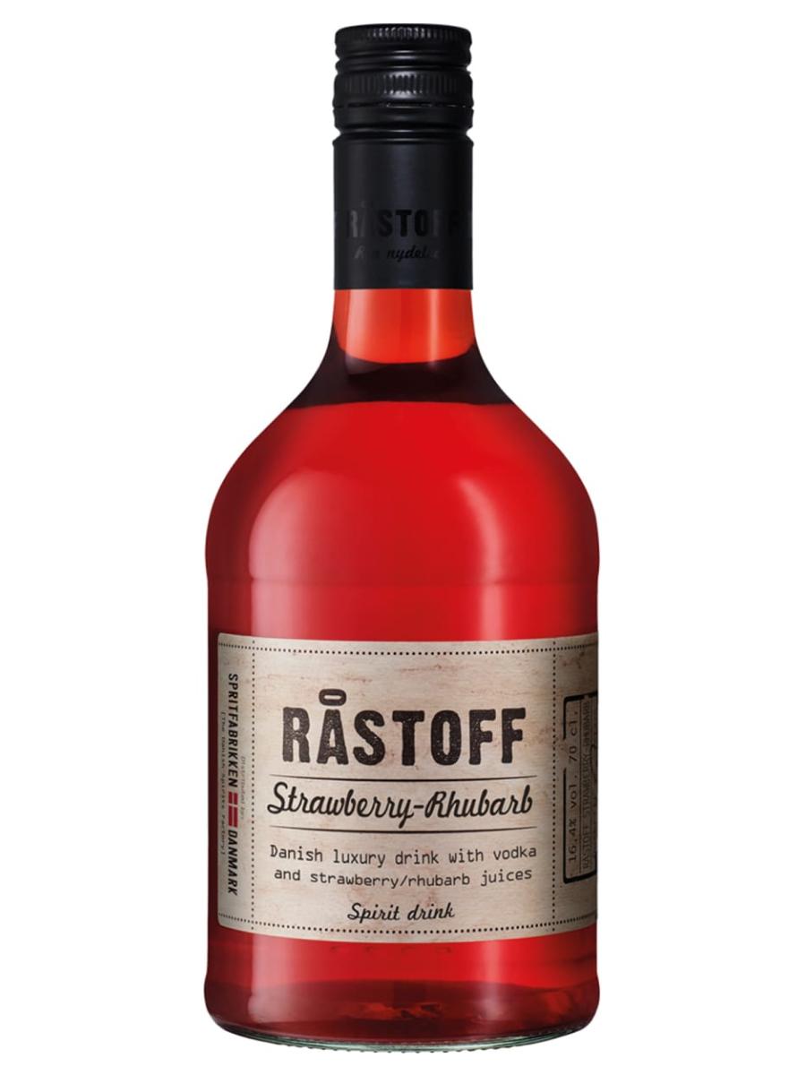 Bottle of Raki alongside fresh rhubarb