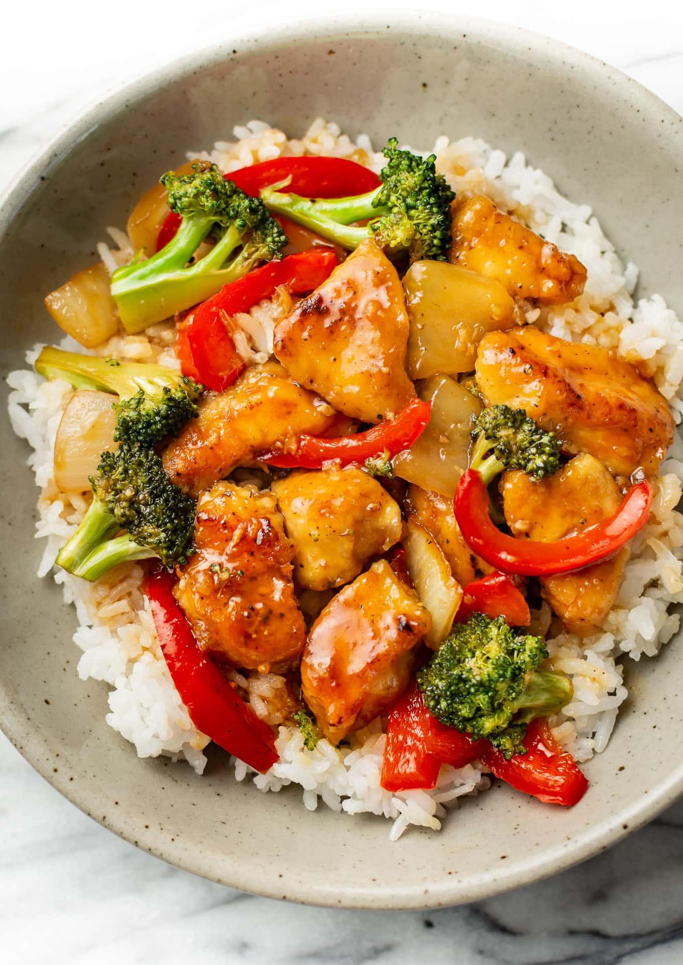 close-up shot of the chicken stir-fry showing the texture of the chicken and vegetables
