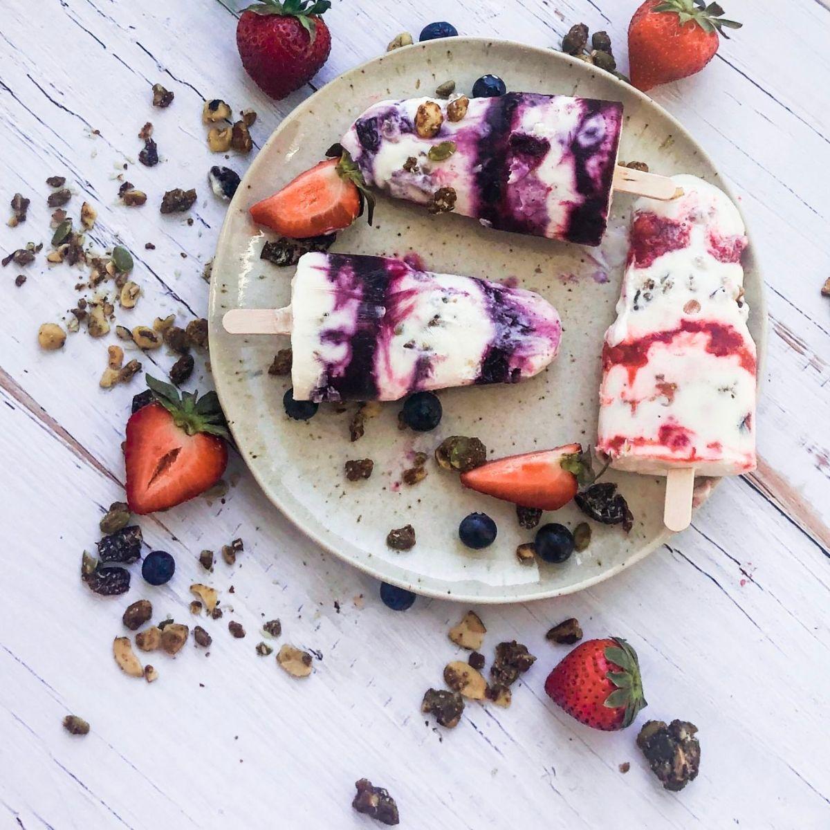 Goji Berry Yogurt Parfait Cake Pops being dipped in yogurt melts