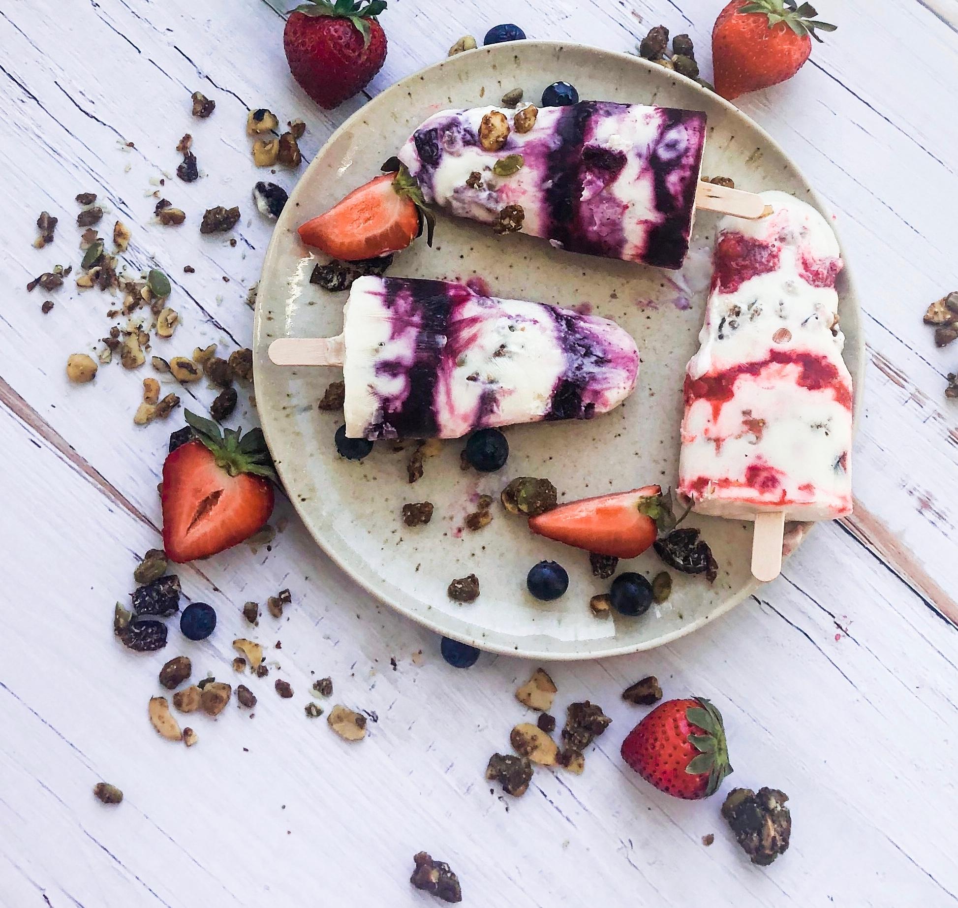 A child decorating Goji Berry Yogurt Parfait Cake Pops with sprinkles