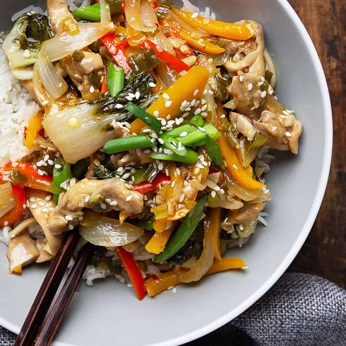 lemon-herb chicken and vegetable stir-fry served on a plate