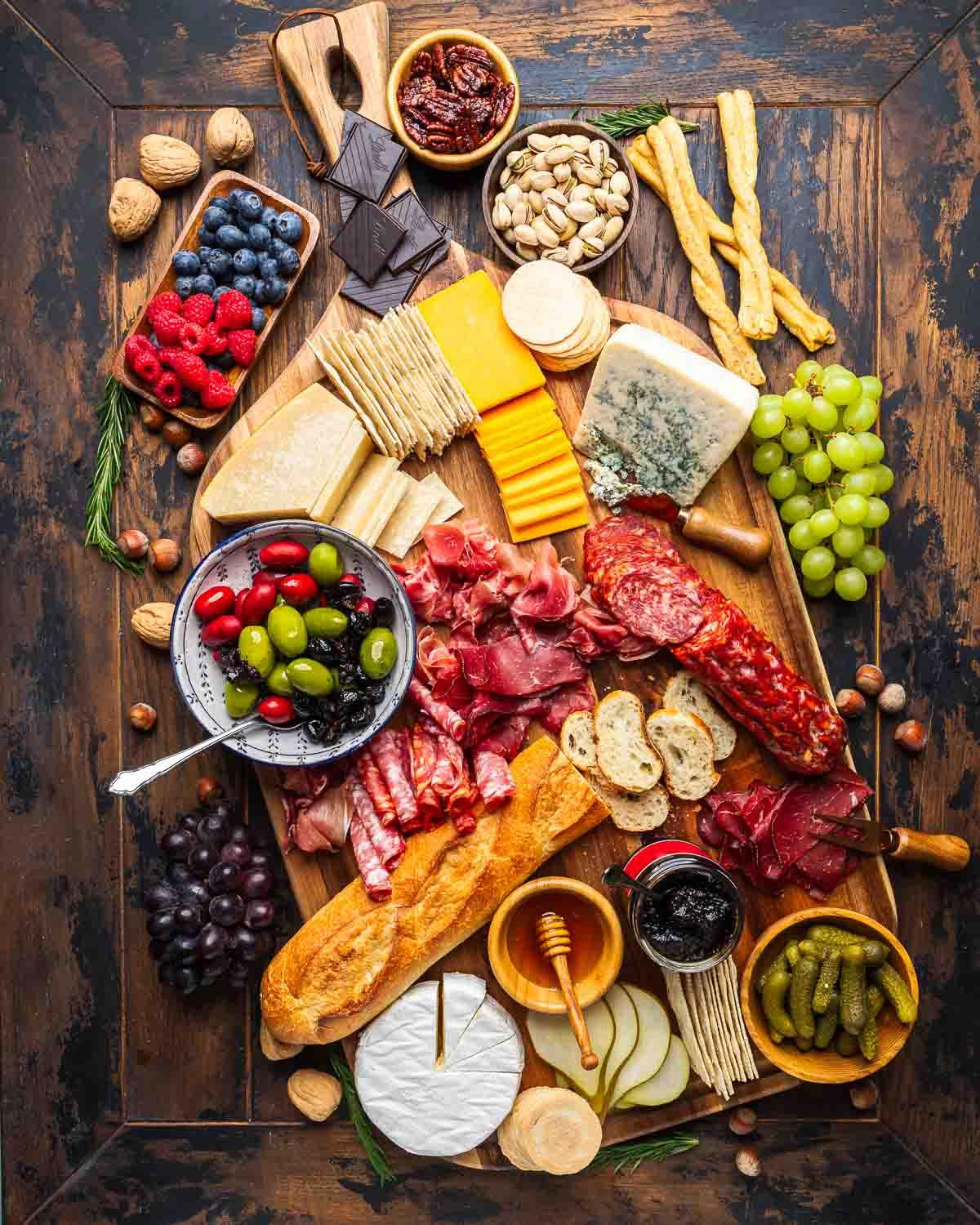 overhead shot of the cheese board with small bowls of homemade jam
