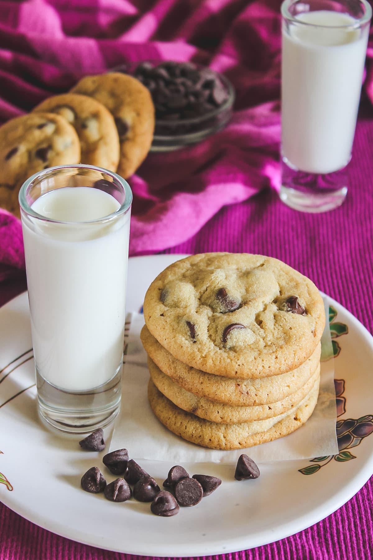 chocolate chip cookies with a glass of milk