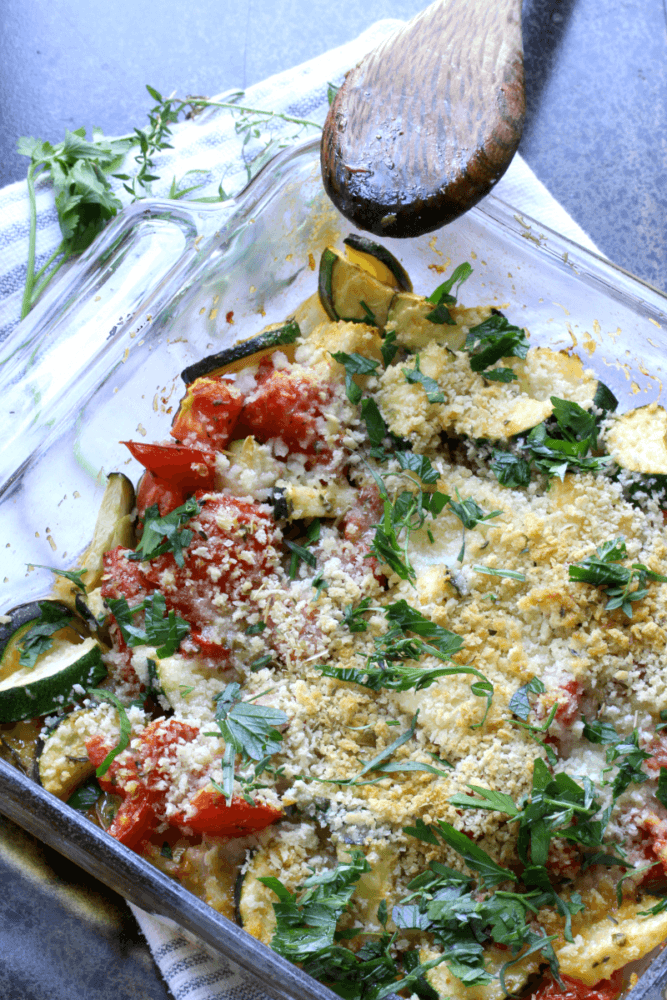 Tomato Zucchini Tarragon Bake with parmesan cheese on top