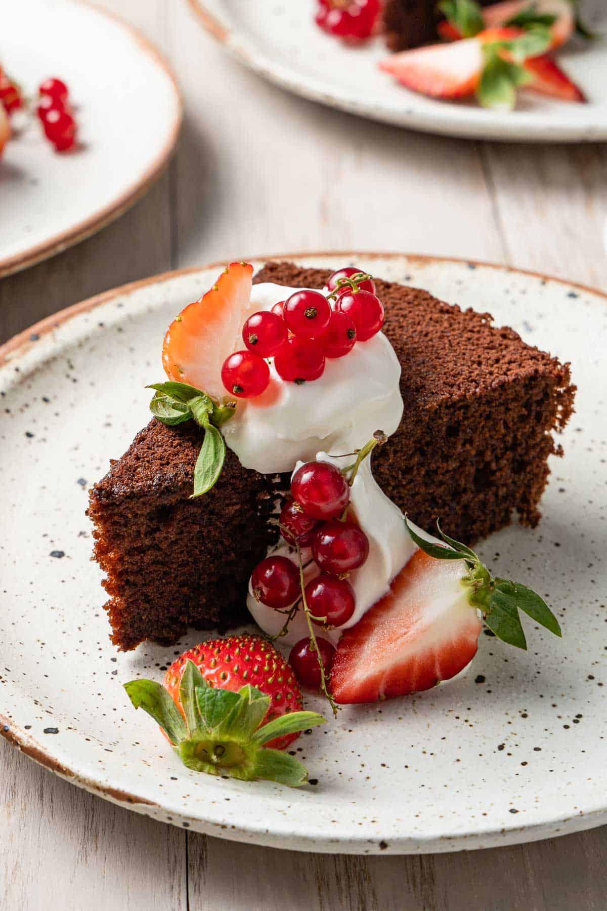 basil olive oil chocolate layer cake with Mediterranean decor